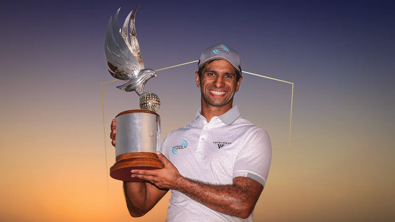 Golfer holding the Abu Dhabi Championship trophy